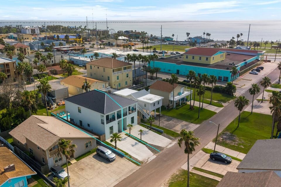 Aerial view near beach, poolside paradise retreat