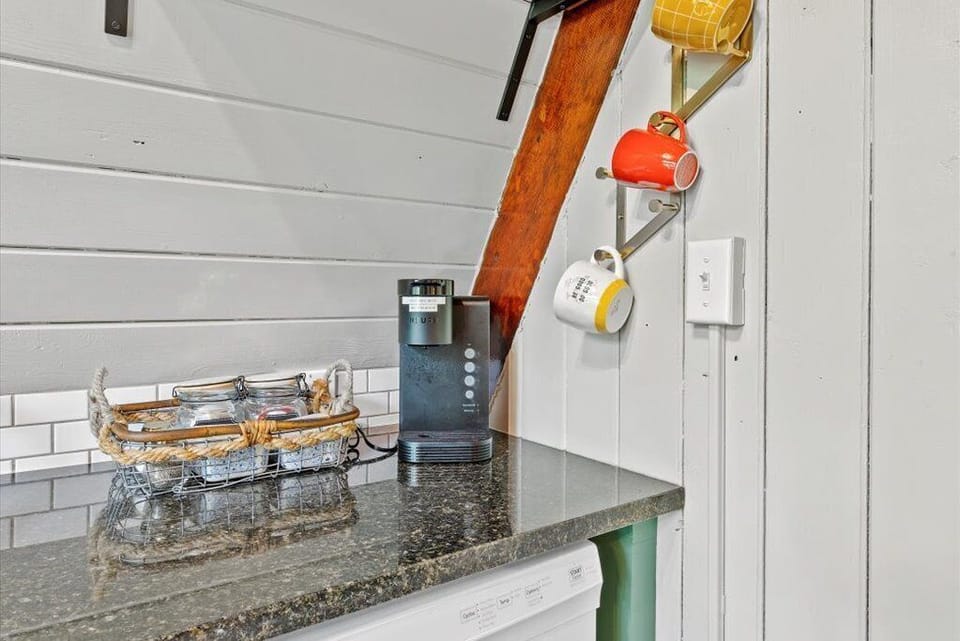 Complimentary coffee/tea bar.  Pods only.  Drip coffee maker available.