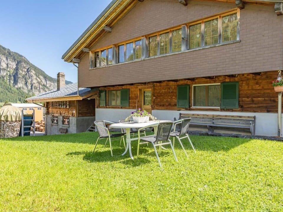 Building, Property, Plant, Table, Window, Sky, House, Shade, Land Lot, Outdoor Table