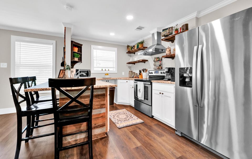Kitchen Island Bar with 3 additional seats for dining or just hanging out.