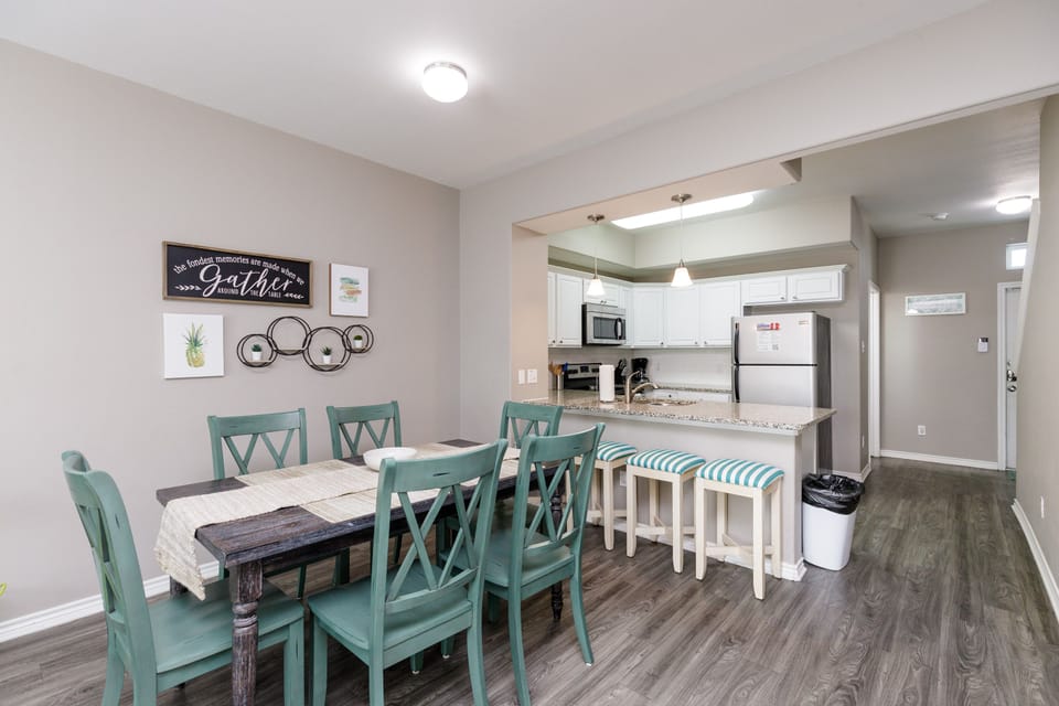 Open dining and kitchen area with plenty of seating for the whole family to spend time together
