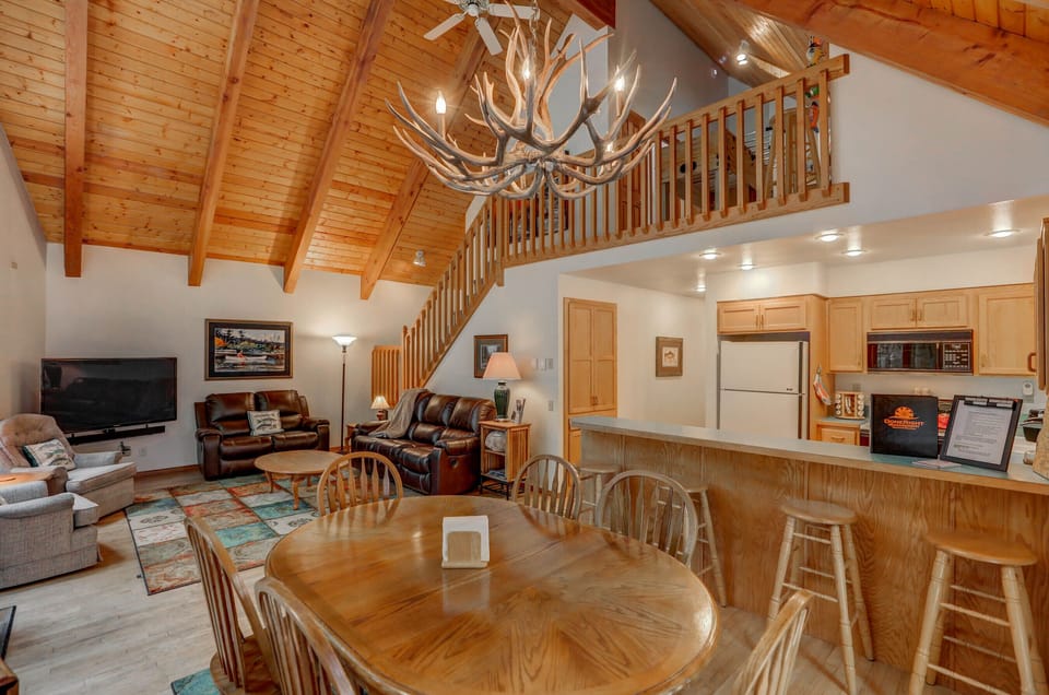 Dining, kitchen, living - up to loft