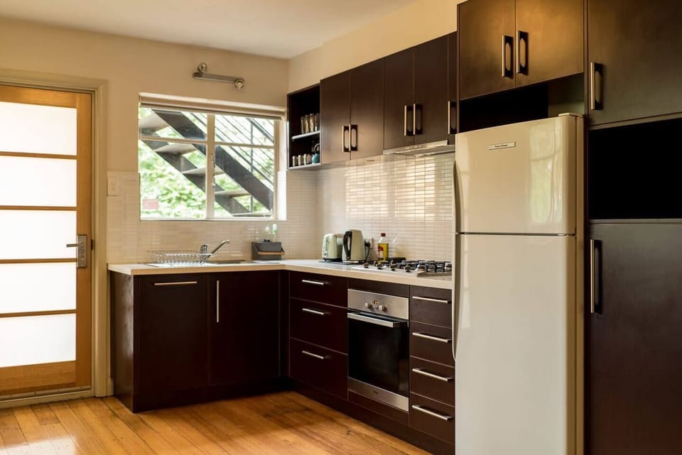 Cook up a feast with ease in the well-appointed kitchen, complete with gas stove, generous prep space and modern finishes.
