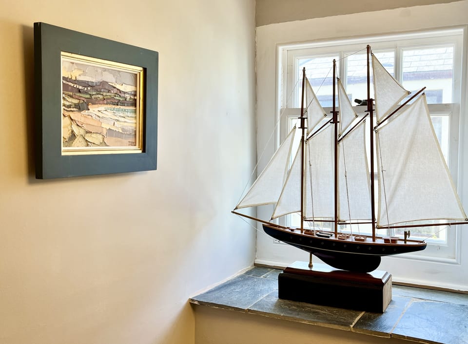 loads of 'marine character' - vintage sailing ship and local artist