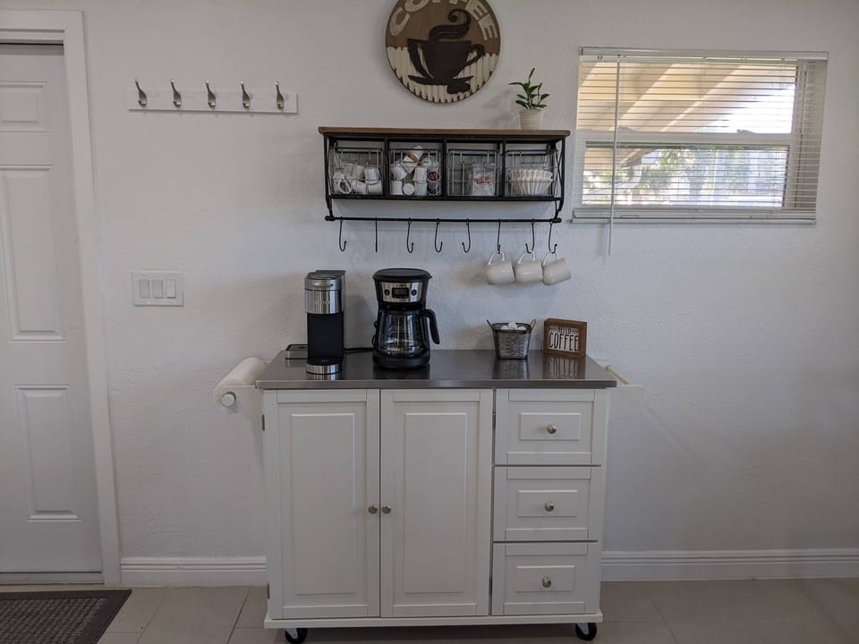 The coffee bar has a Keurig, drip, and French press. 