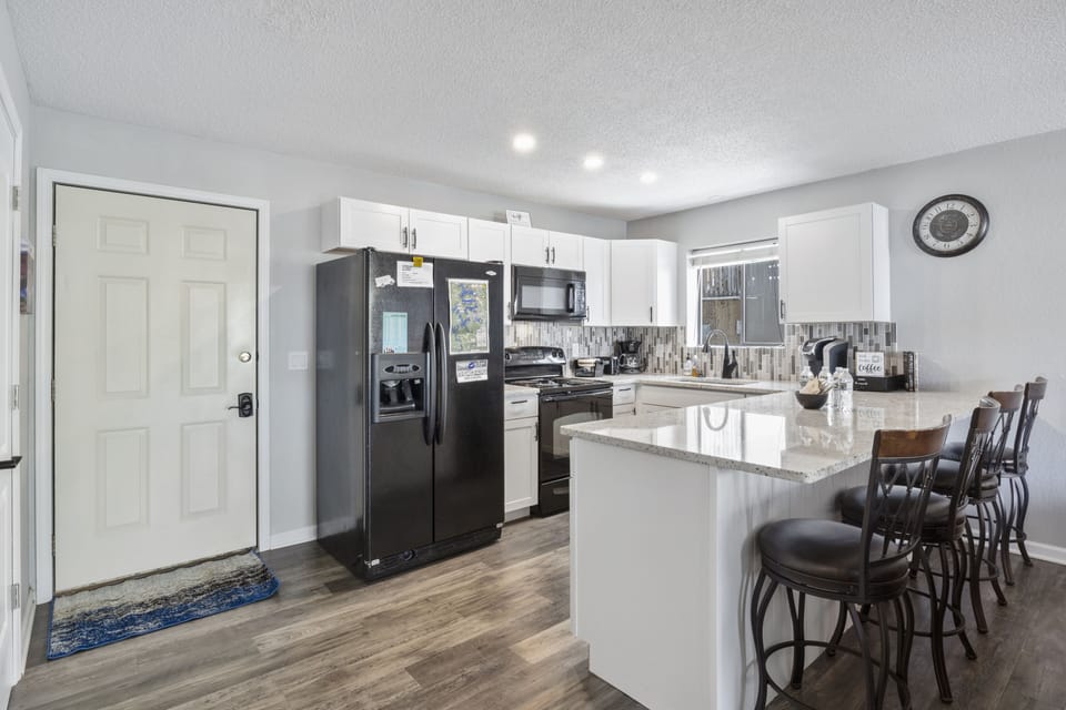 Fully stocked kitchen with Keurig, Belgian Waffle Maker, Knife Block, and more!