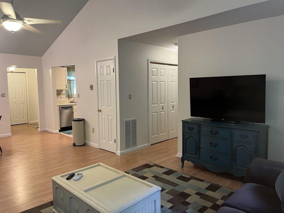 Open living and dining space, 55" TV