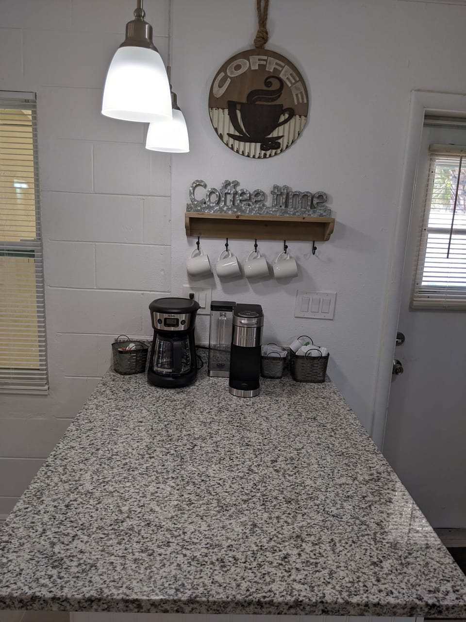 The coffee bar has a Keurig, drip, and French press. 