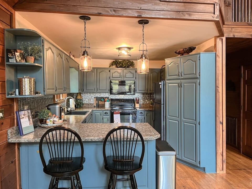 full equipped kitchen including spice cabinet, coffee station, & more