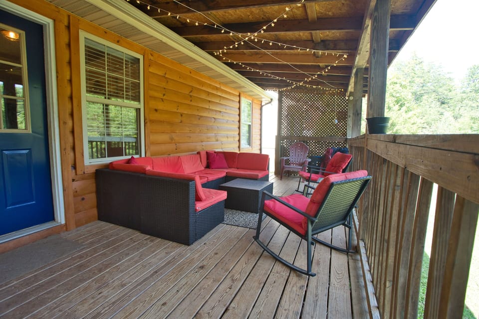 Sectional outdoor sofa with lights, corn hole, gas grill-overlooking the forest
