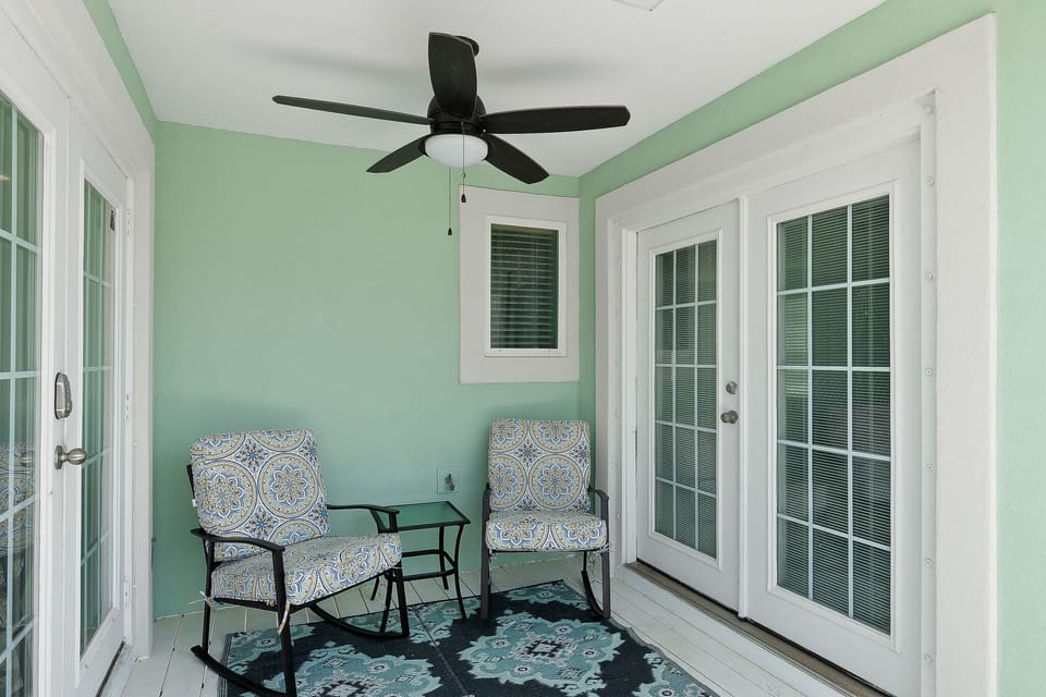 Covered balcony perfect for morning coffee, or reading a book under the sun (off of the Oceanside Suite and kitchen table nook)