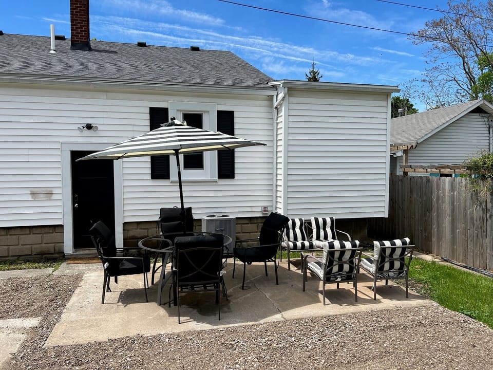 Back Patio Seating adjacent to Parking Area