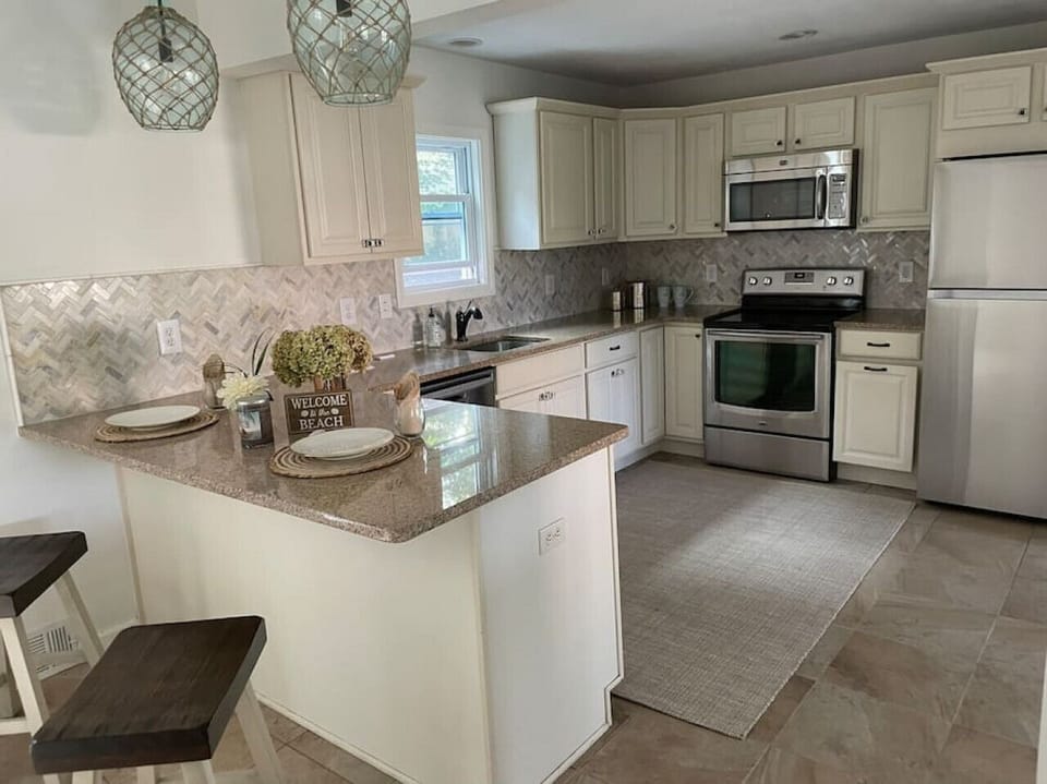 Cook like a local! Our fully equipped kitchen features modern stainless steel appliances and all the premium cookware you need to whip up a gourmet meal.