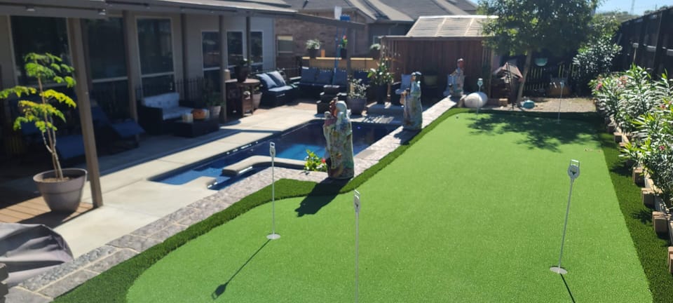 Putting green and 21x9 swimming pool 