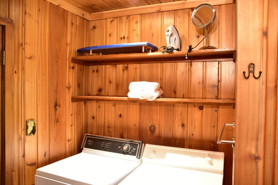 washer/dryer in bathroom at entrance level