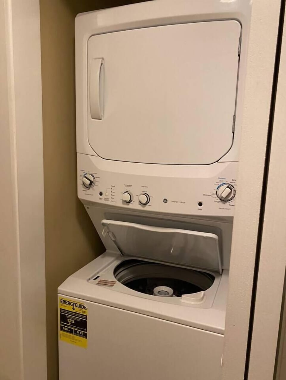 Stacked washer and dryer inside the condo - I provide plenty of Tide Pods and dryer sheets for your stay.