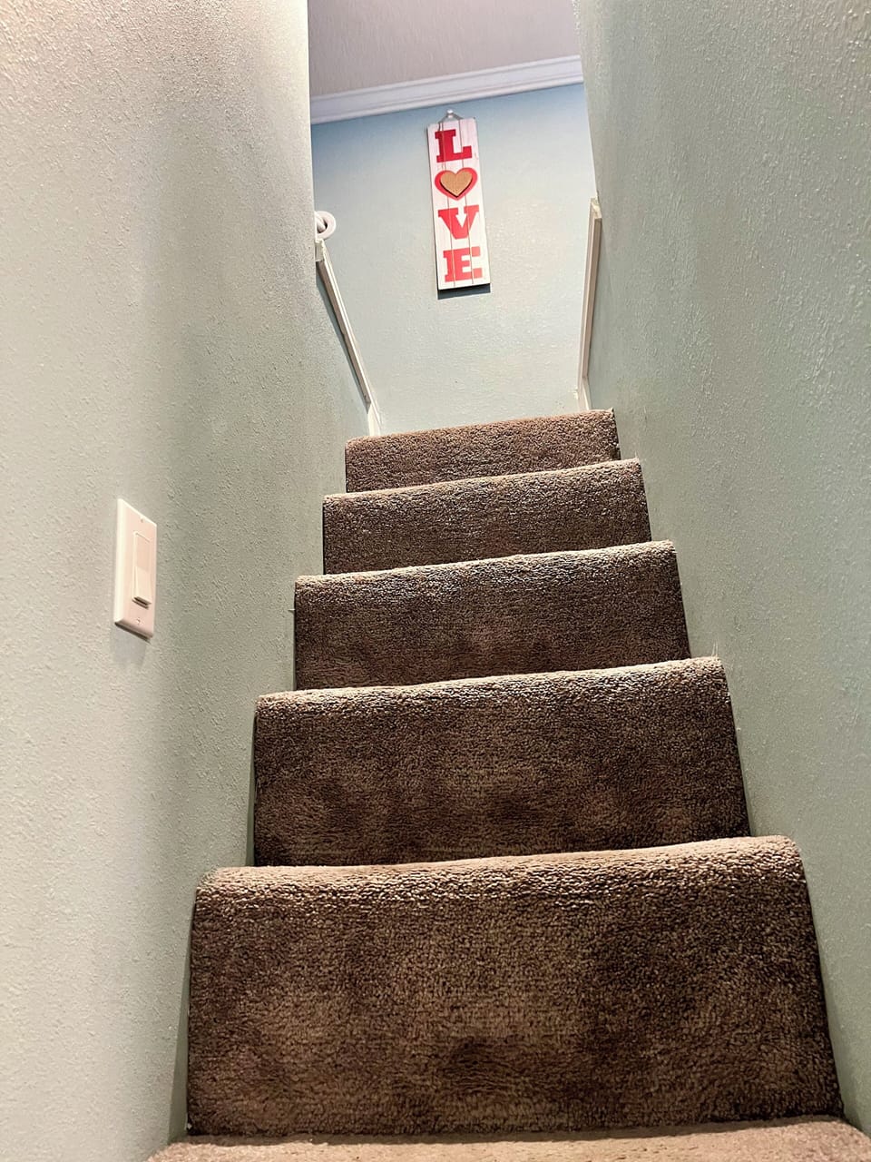 Stairs to both loft rooms