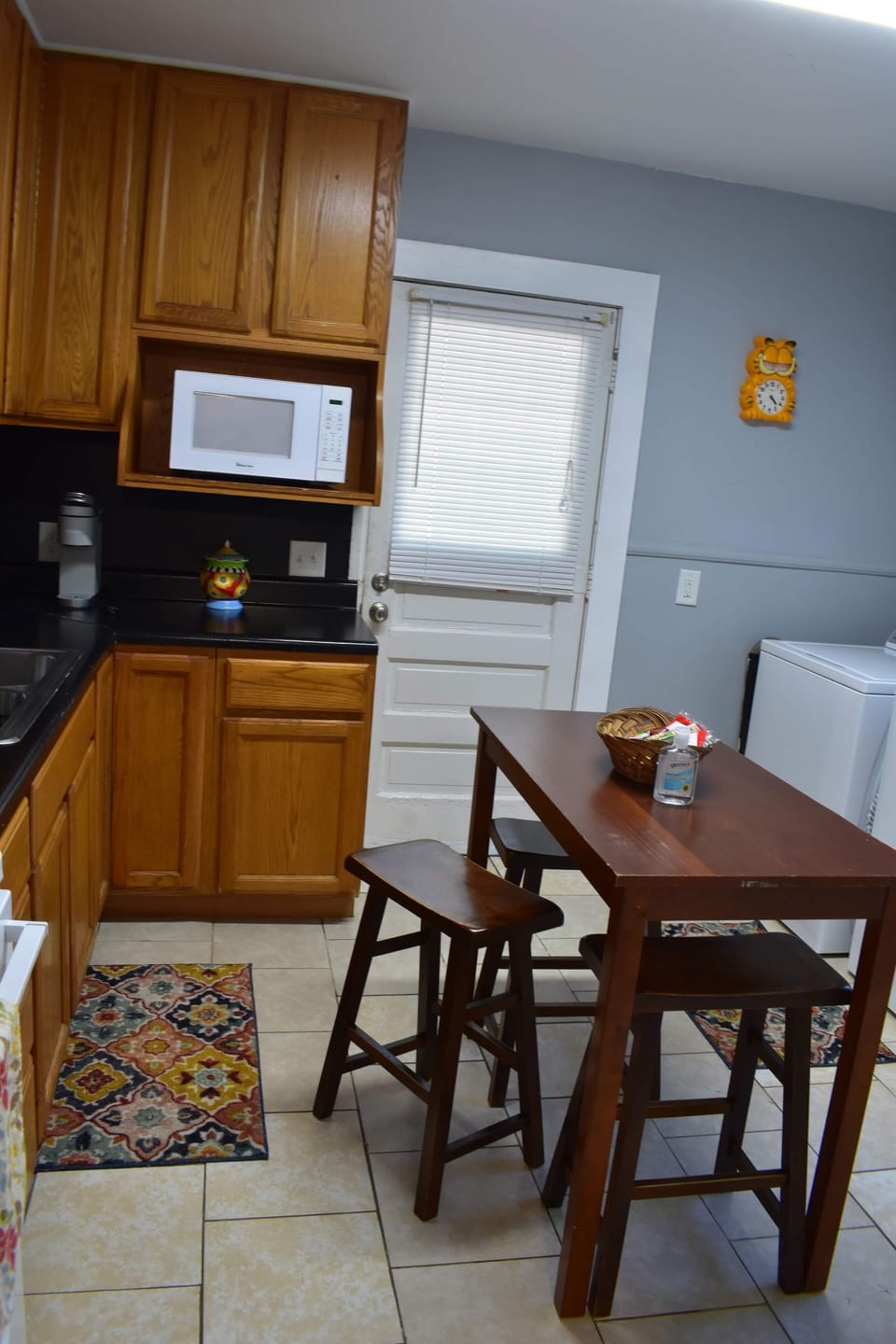 Eat in kitchen- island and table with tuck away saddle stools