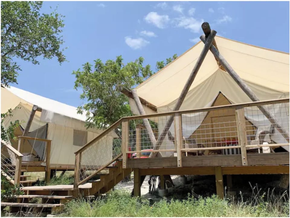 Two tents are joined by a lower landing, great for families. 