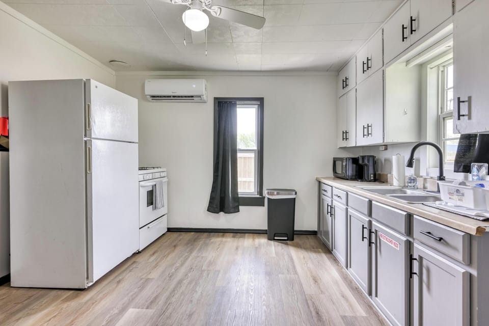 Enjoy the full kitchen with gas range and full size fridge