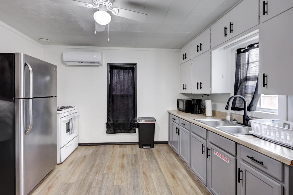 Enjoy the full kitchen with gas range and full size fridge