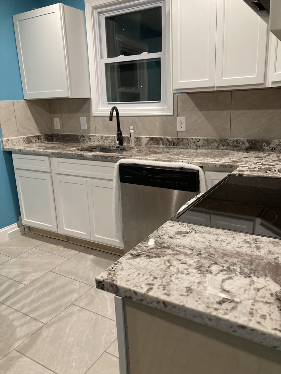Granite counters, fully applianced with stainess steel, electric 4 burner stove,