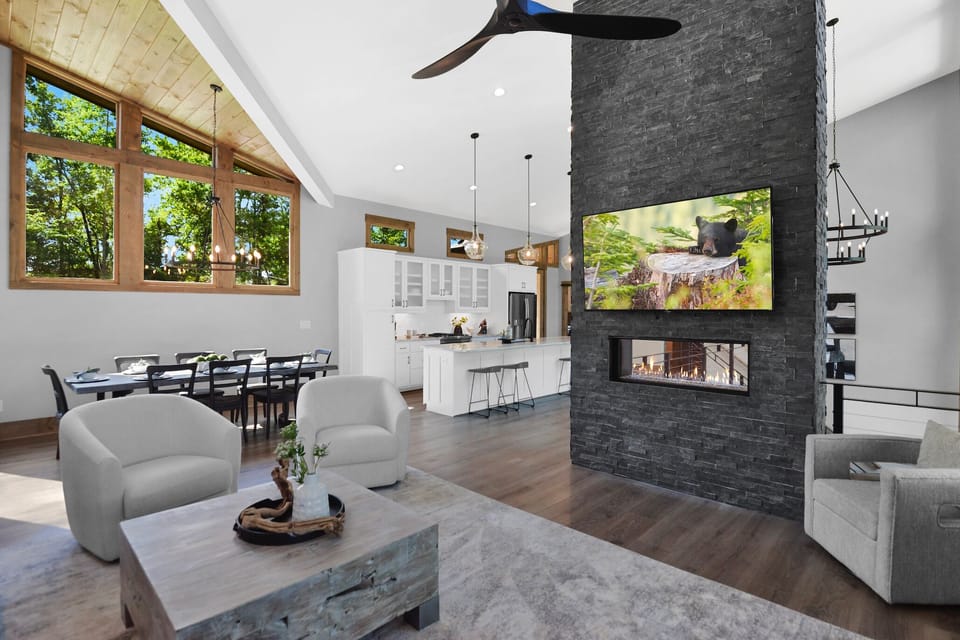 Enjoy cozy fireside moments in the open area living room.