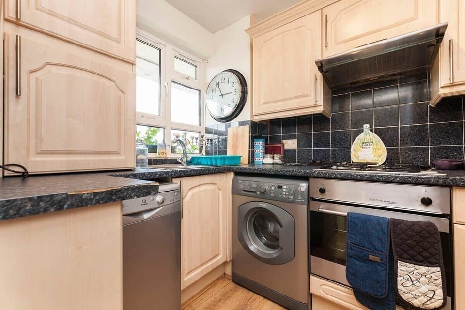 Washing machine. Dishwasher. Oven and gas hob. Microwave. Large fridge freezer.