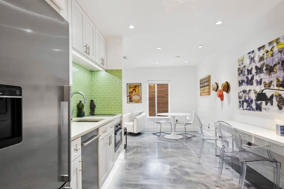1st floor apartment with kitchen, living room, queen bedroom adjoining bathroom with walk in shower and washer/dryer.