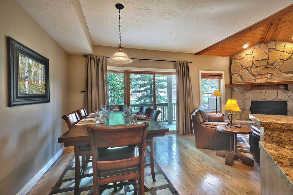 Dining room with solid wood table and seating for 6 adjacent the living room