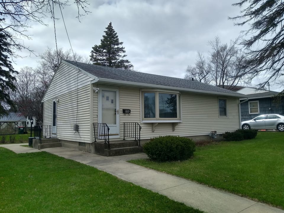 Outside view of ranch style home.  All 3 bedrooms on the main level and bathroom. 2nd bathroom downstairs.