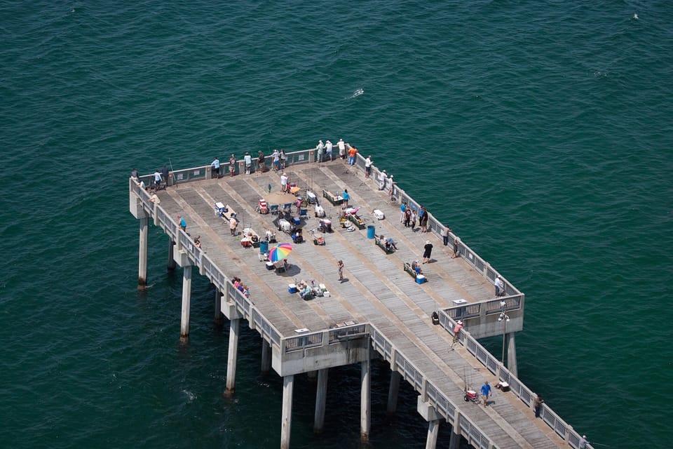 Russell-Fields City Pier directly across by Pier Park shopping and dining.