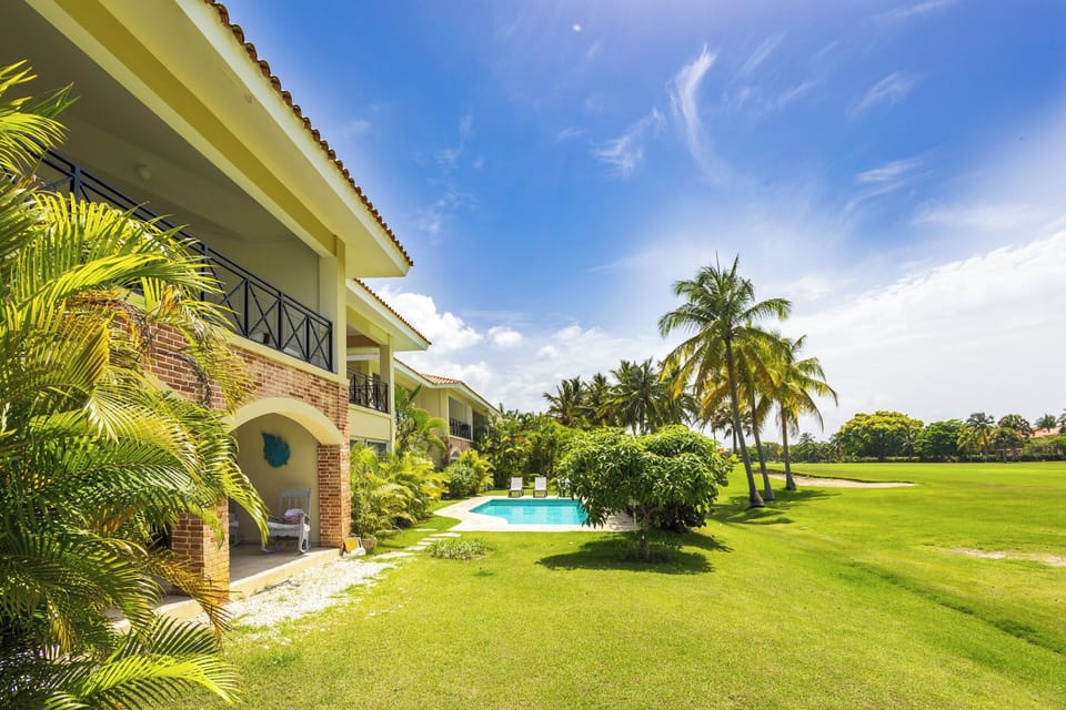 View of the balcony from the golf course. 