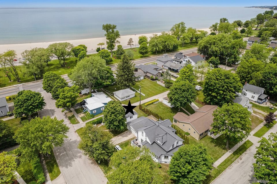 Less than a two minute walk from the driveway to the sand. 