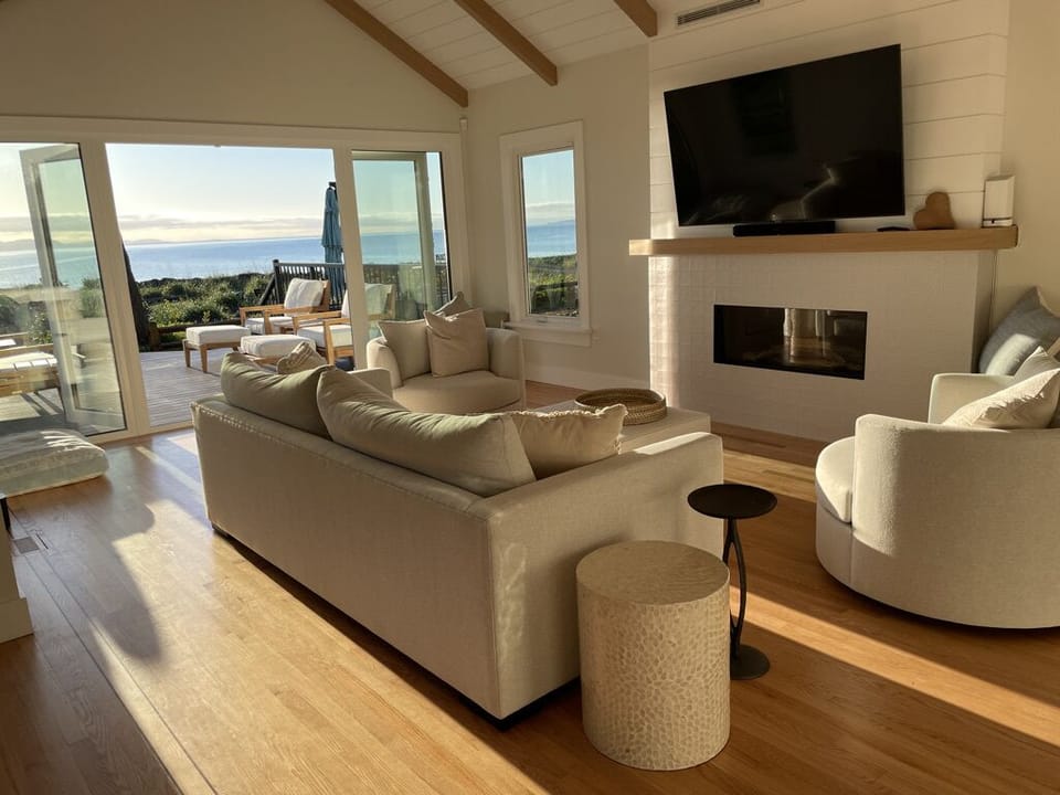 Living room opens directly onto the deck.
