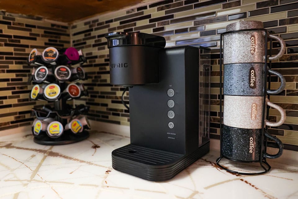 Keurig coffee maker with everything you need for that morning cup.