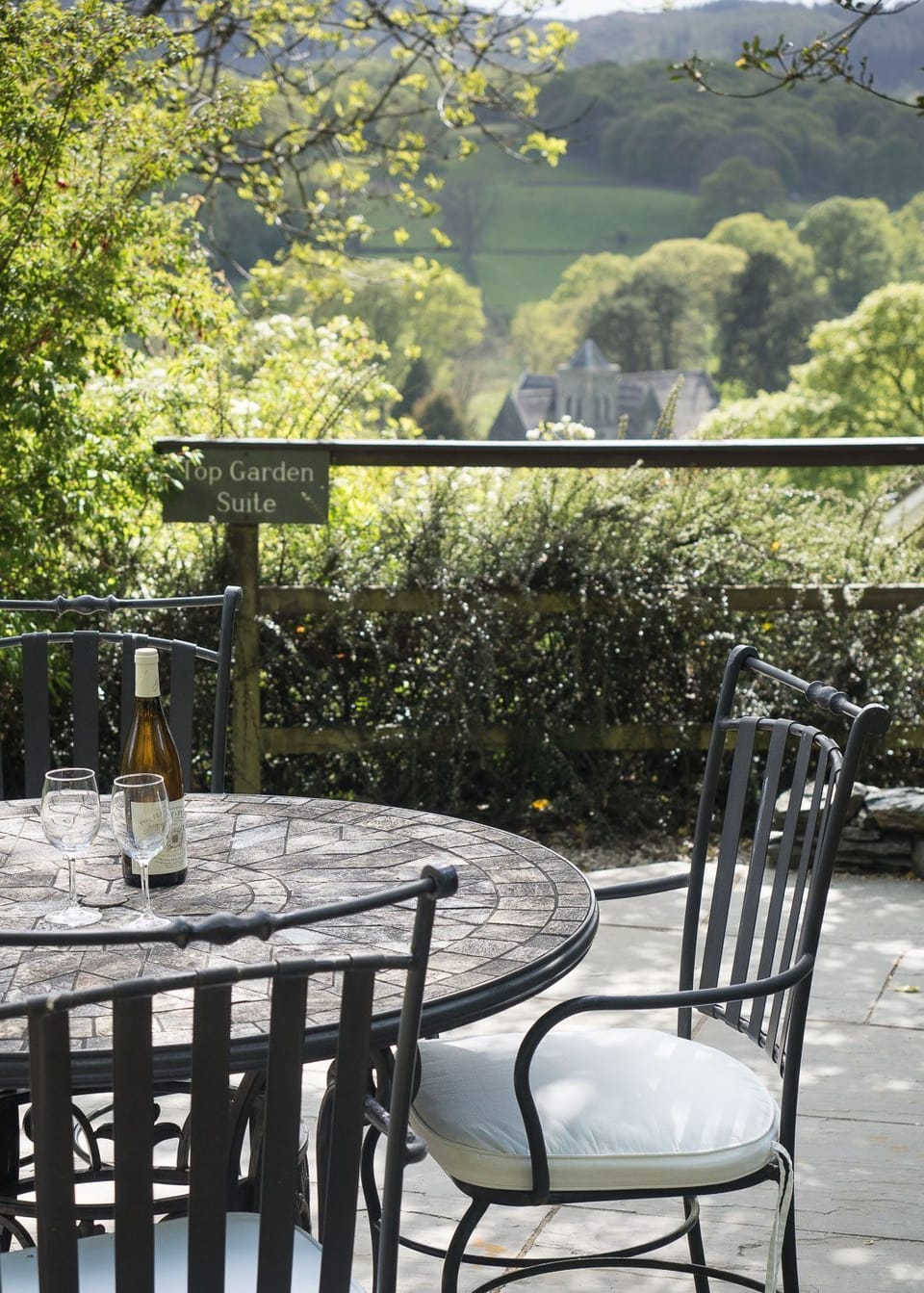 Patio with garden furniture at Top Garden Suite