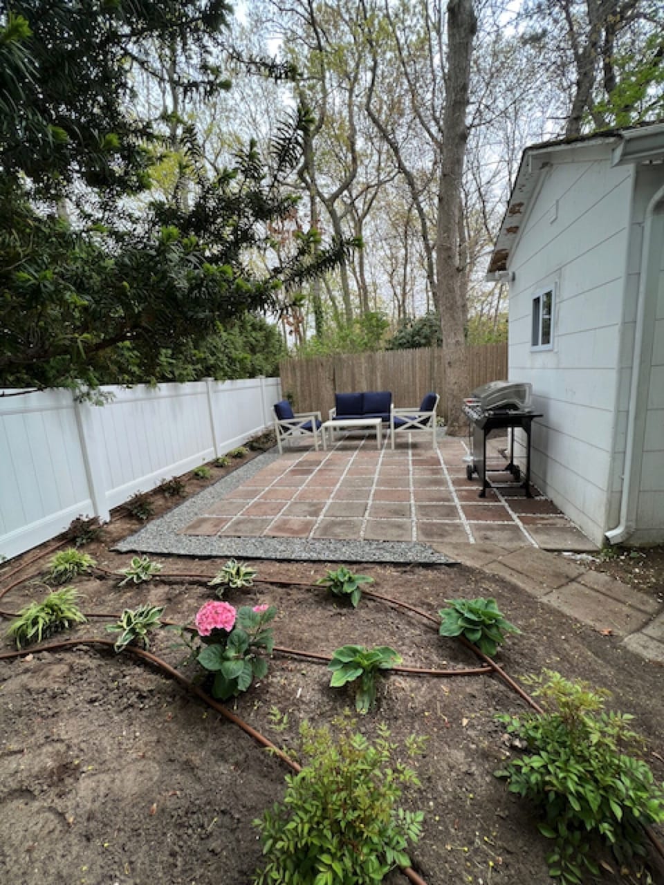 Private backyard with barbeque.