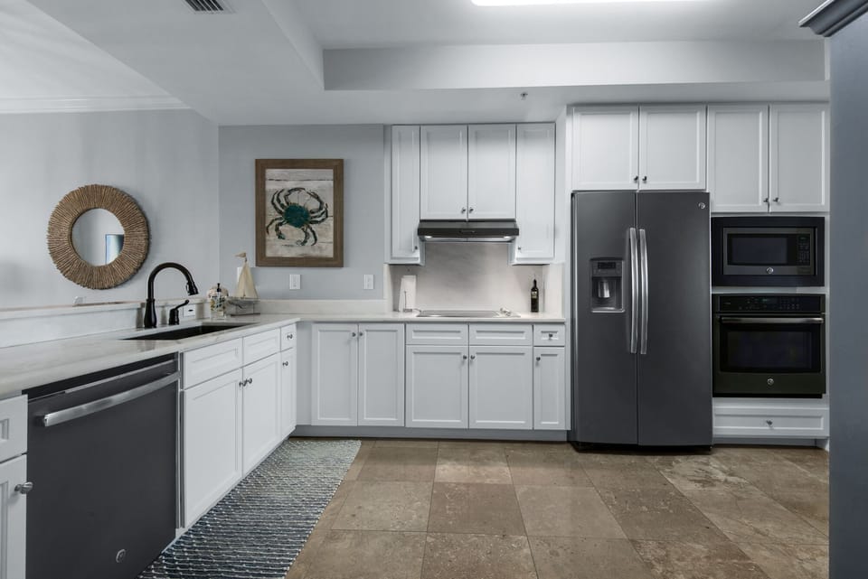 Supremely decorated and appointed kitchen, with striking white quartz counters