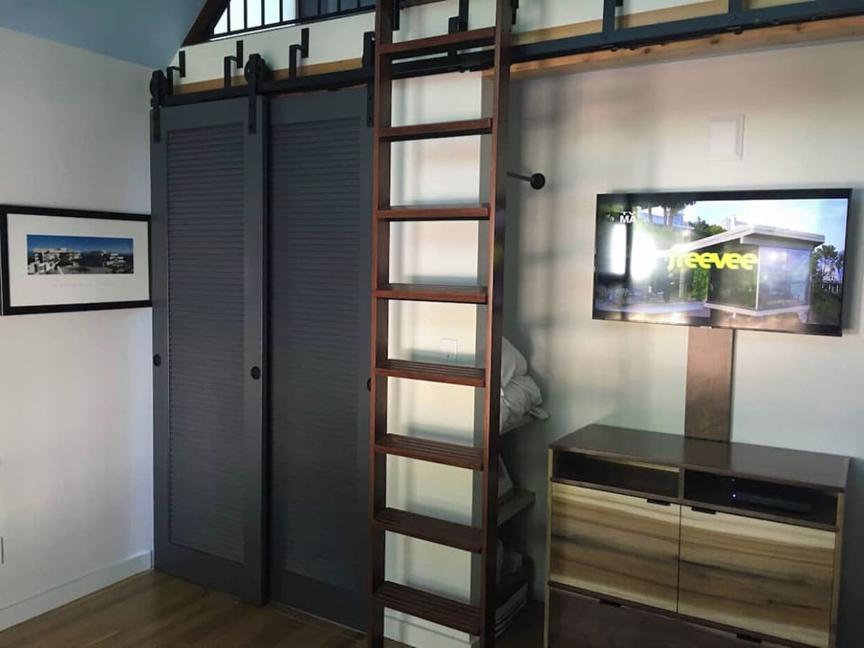 Living room can be closed off from rest of space 