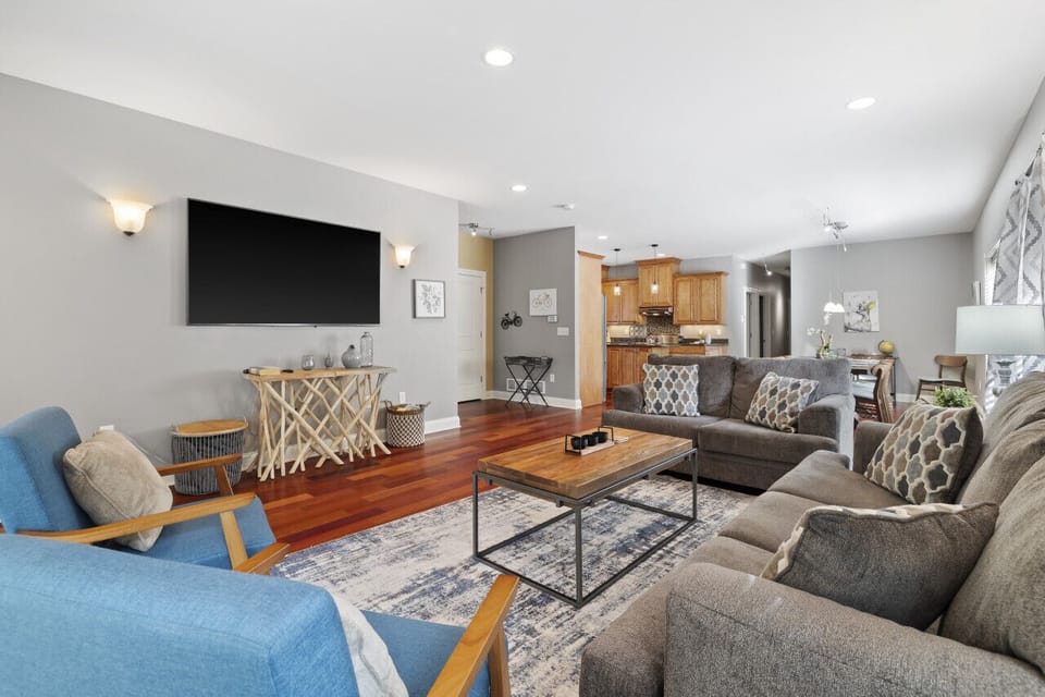 Spacious, modern, and fully equipped—this open-concept living area is perfect for family gatherings or relaxing with friends. From the cozy living room to the stylish dining area and fully stocked kitchen, everything you need for a comfortable stay is rig