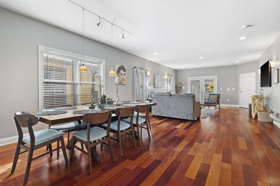 Perfect for family meals or group gatherings, this dining room table seats 10 comfortably! 🍽️ Gather around and make memories in this spacious, inviting space