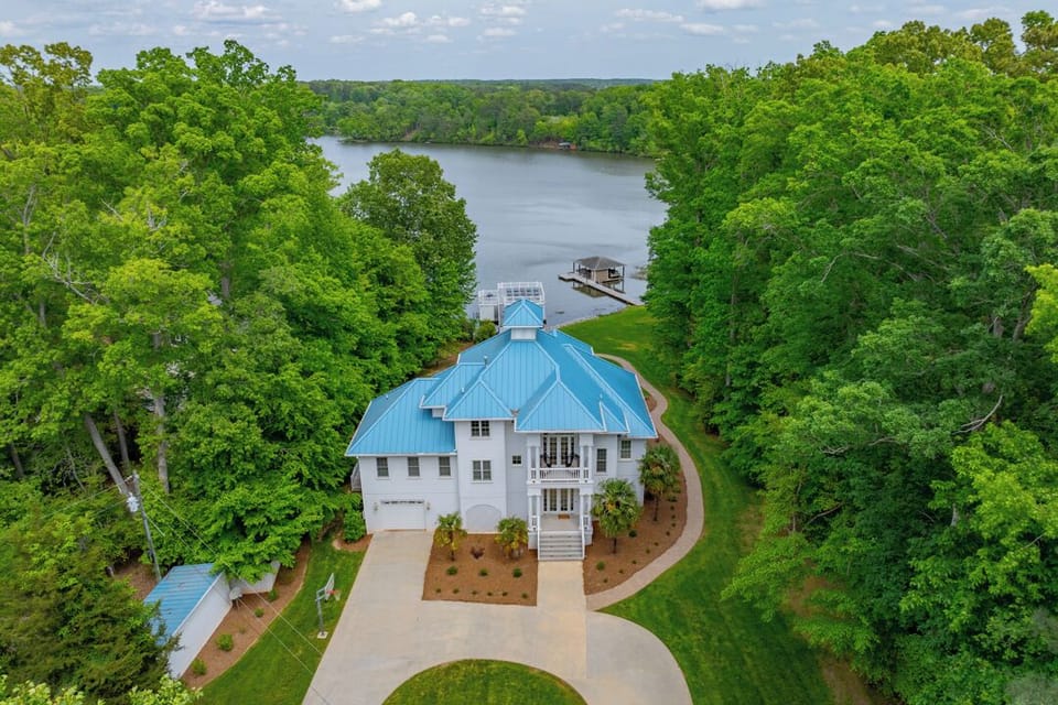 Aerial view of Blue Heaven from the front showing the lake 