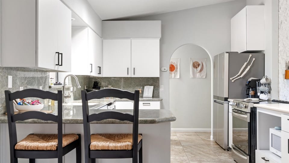 Large kitchen with barstool seating