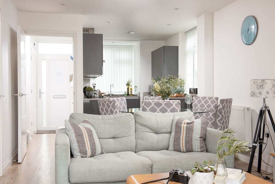 Living room with access to dining area and kitchen -  Kingsley House