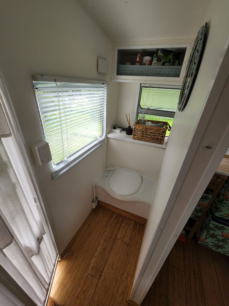 Adjoining ensuite toilet is convenient and adequate