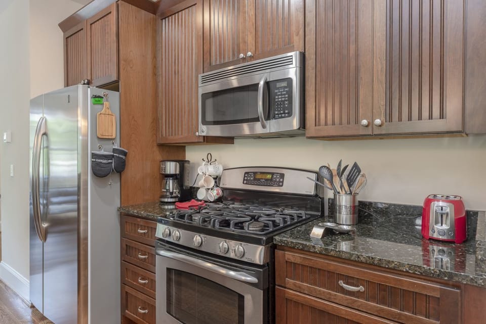 Kitchen with dishwasher and two coffeemakers (Standard Drip & Keurig).