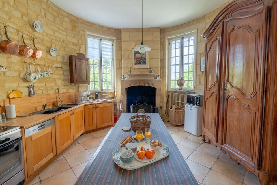The kitchen has room to cook & seating for a quick meal.