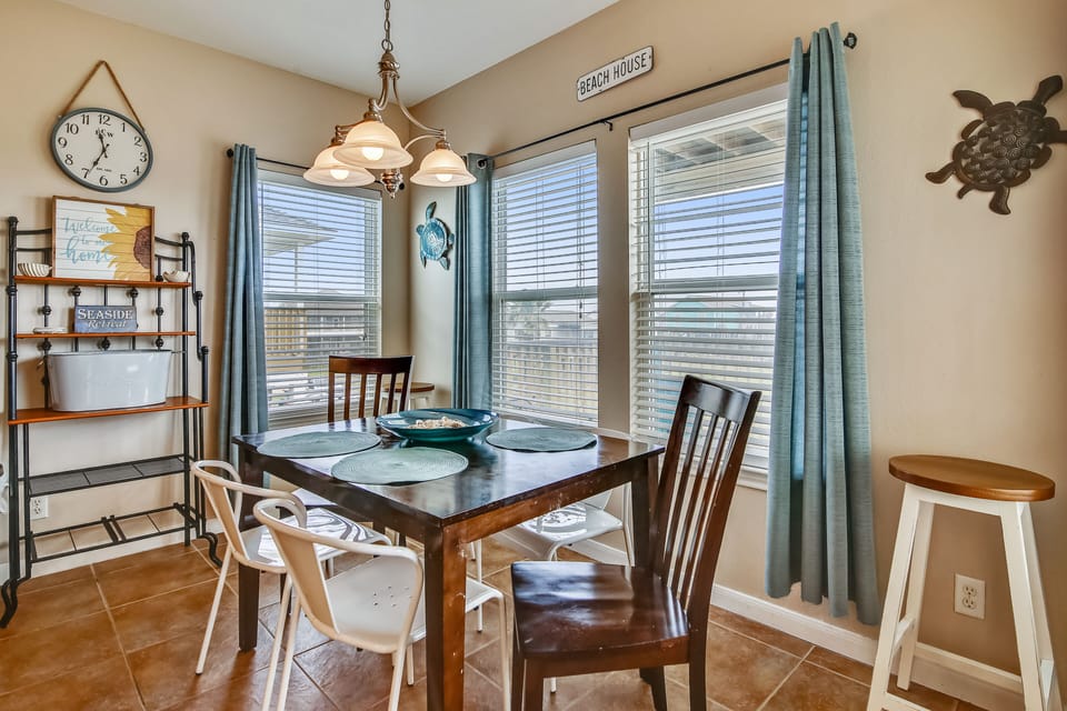 The Cheery Dining Table Seats A Crowd! - Centrally located between living room and kitchen, the dining table makes a great game and puzzle spot, too!