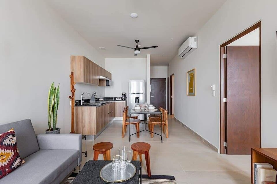 Living room, dining area and kitchen
